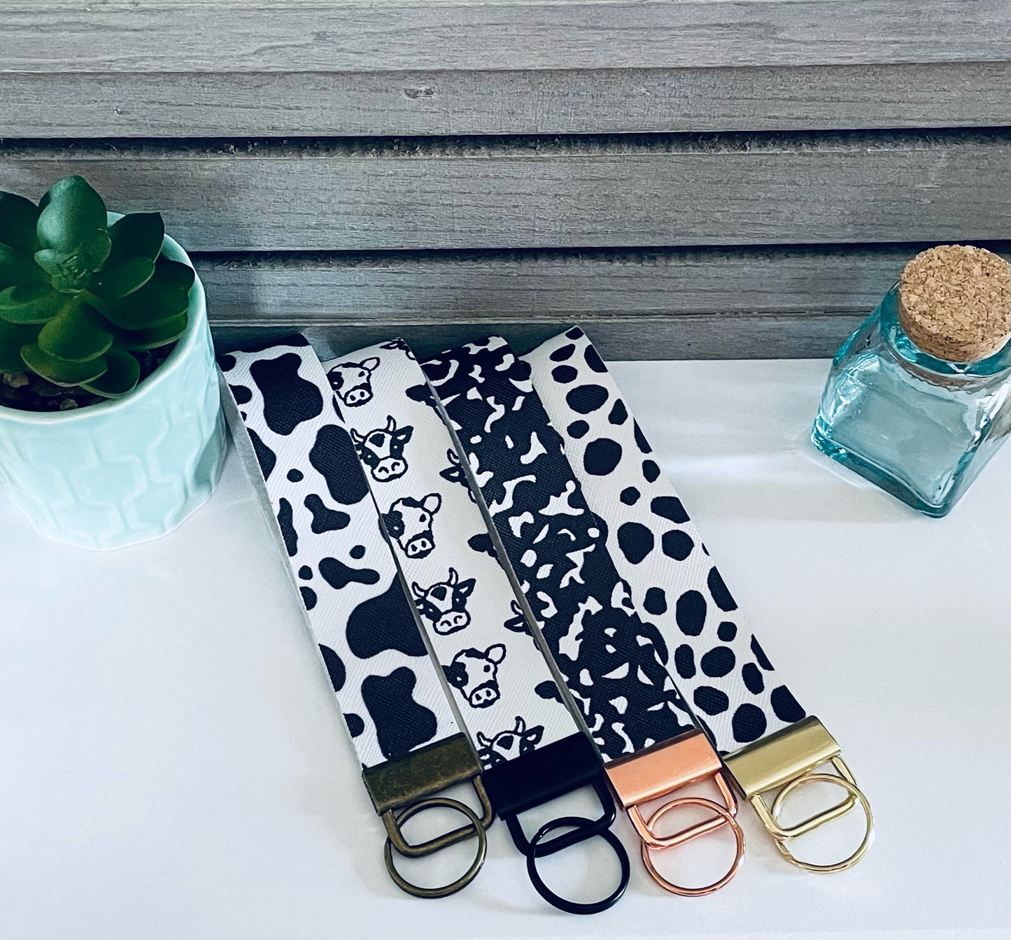 Cow print key fob wristlets